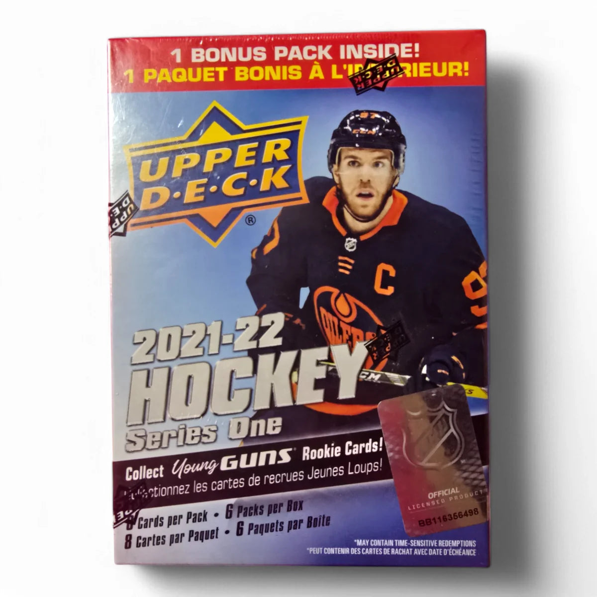 A pack of 2021-22 Upper Deck Series One Hockey cards featuring a player in a hockey uniform, with a red and yellow design including the text 'Upper Deck' and 'Hockey Series One'.