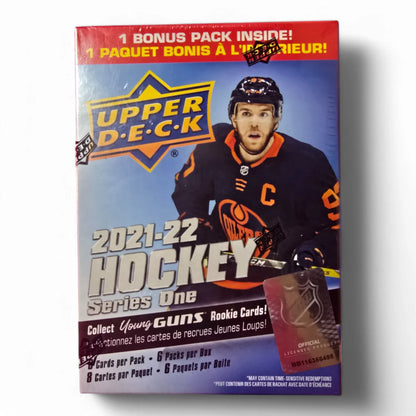 A pack of 2021-22 Upper Deck Series One Hockey cards featuring a player in a hockey uniform, with a red and yellow design including the text 'Upper Deck' and 'Hockey Series One'.