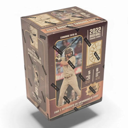 A sealed blaster box of 2022 Panini Capstone Baseball cards featuring images of MLB players and a young baseball player in action.