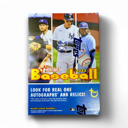 2022 Topps Heritage Baseball Blaster Box packaging featuring images of baseball players and the text related to the product contents and the Topps brand.