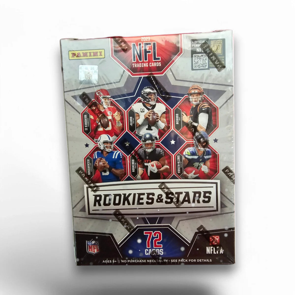 A sealed blaster box of 2023 Panini Rookies & Stars Football cards featuring images of NFL players in various team uniforms.