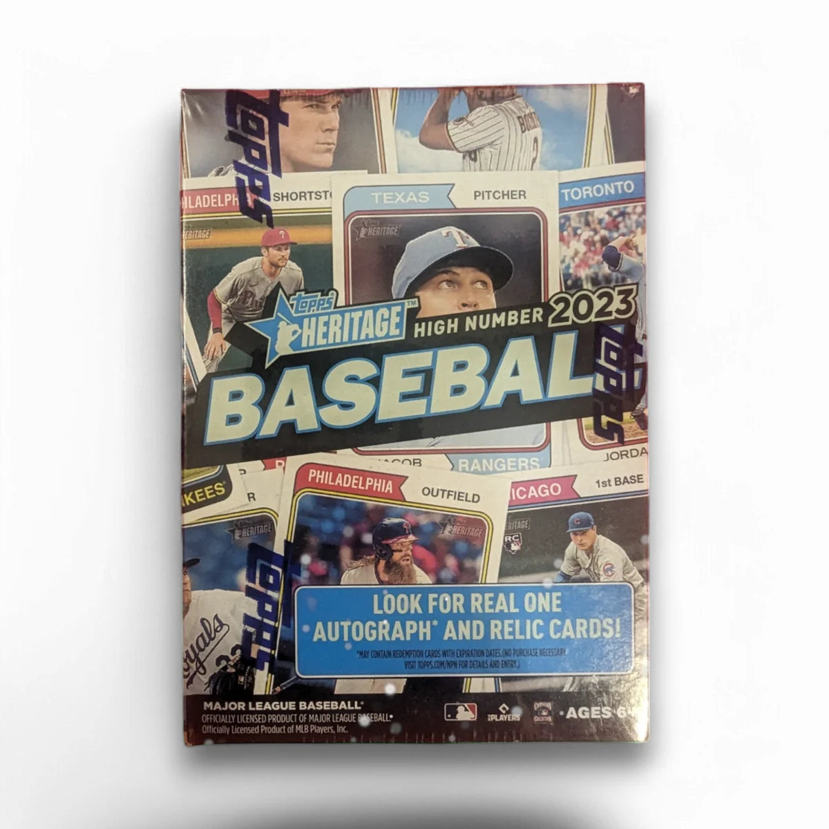 Front of the 2023 Topps Heritage High Number Baseball Blaster Box packaging featuring various baseball players and the text 'HERITAGE HIGH NUMBER BASEBALL' prominently displayed.